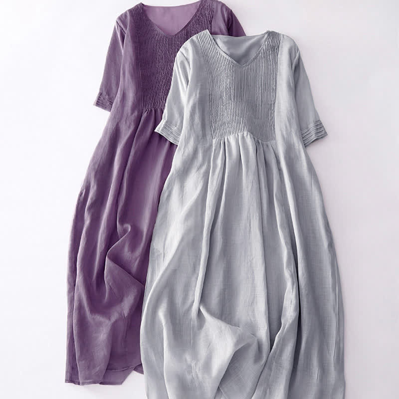 Vestido midi informal de manga corta con cuello en V, pliegues tipo acordeón y bolsillos, con estampado de Buddha Stones. - image 27