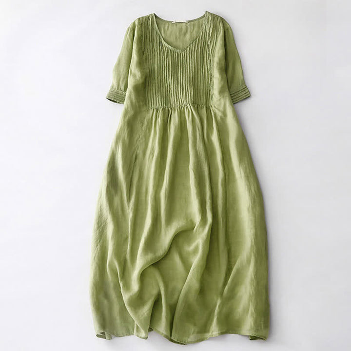 Vestido midi informal de manga corta con cuello en V, pliegues tipo acordeón y bolsillos, con estampado de Buddha Stones. - image 11