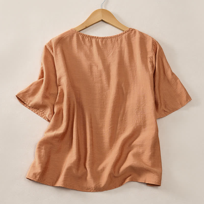 Buddha Stones Camiseta de manga corta para mujer, estilo casual de verano, minimalista, con cuello en V y botones decorativos. - image 1