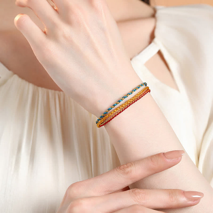 Buddha Stones Pulsera trenzada a mano con cordón de hilo colorido de triple vuelta y diseño de fe. - image 1