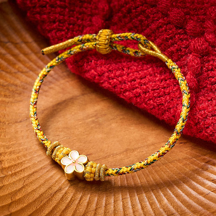 Buddha Stones Pulsera de cuerda trenzada amarilla con flores y raíces - Amarillo - Con accesorio de flor blanca - image 0