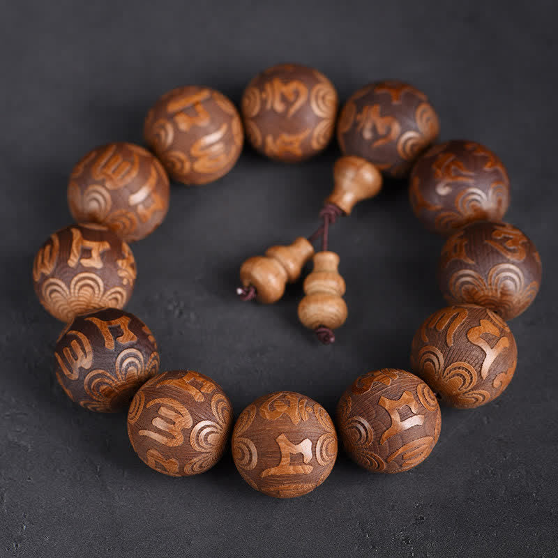 Buddha Stones Pulsera de madera natural Abelia Biflora con corazón Sutra Om Mani Padme Hum - Om Mani Padme Hum - image 0
