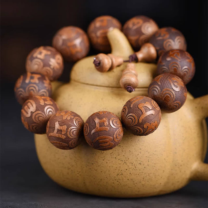 Buddha Stones Pulsera de madera natural Abelia Biflora con corazón Sutra Om Mani Padme Hum - image 1