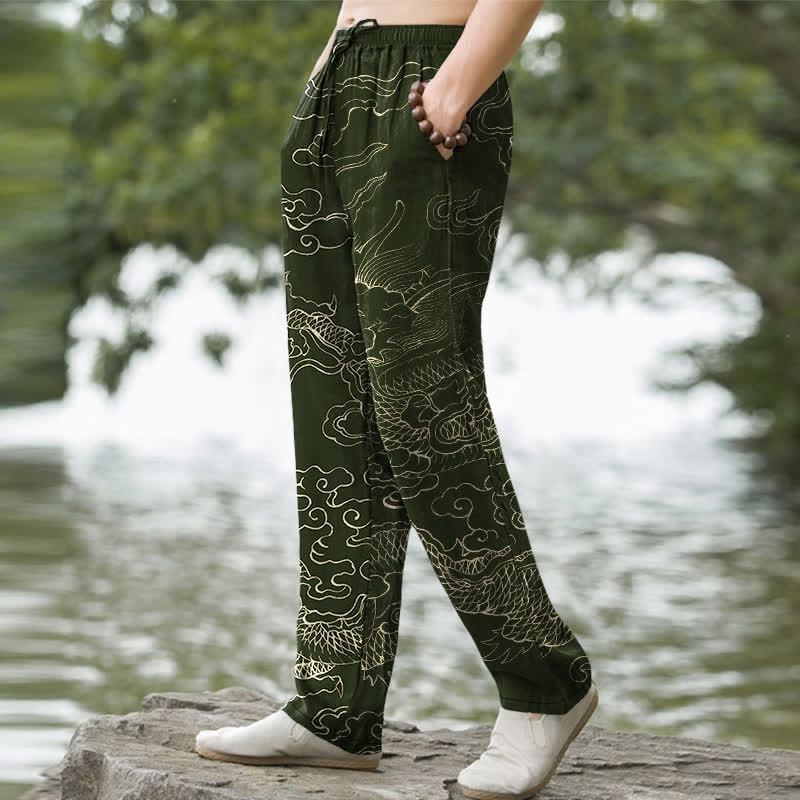 Buddha Stones Pantalones de algodón para hombre con estampado de dragón volador persiguiendo el sol, corte cónico y bolsillos. - image 1