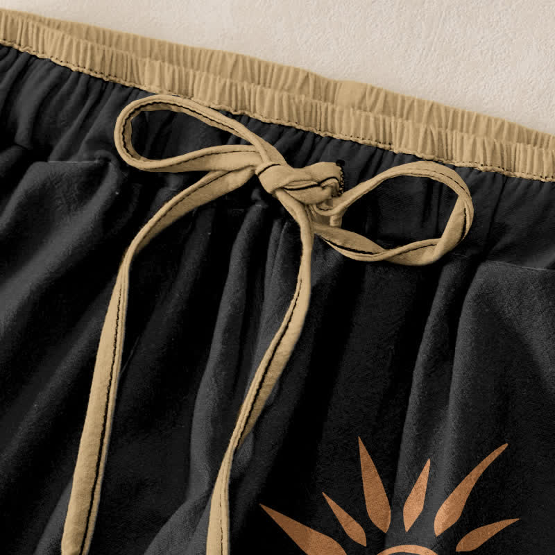 Buddha Stones Pantalones de mujer de algodón con estampado de remolinos solares estilo boho y cintura elástica con bolsillos. - image 1
