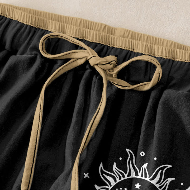 Buddha Stones Pantalones de mujer de algodón puro con estampado de sol, luna y estrellas, cintura elástica y bolsillos. - image 1