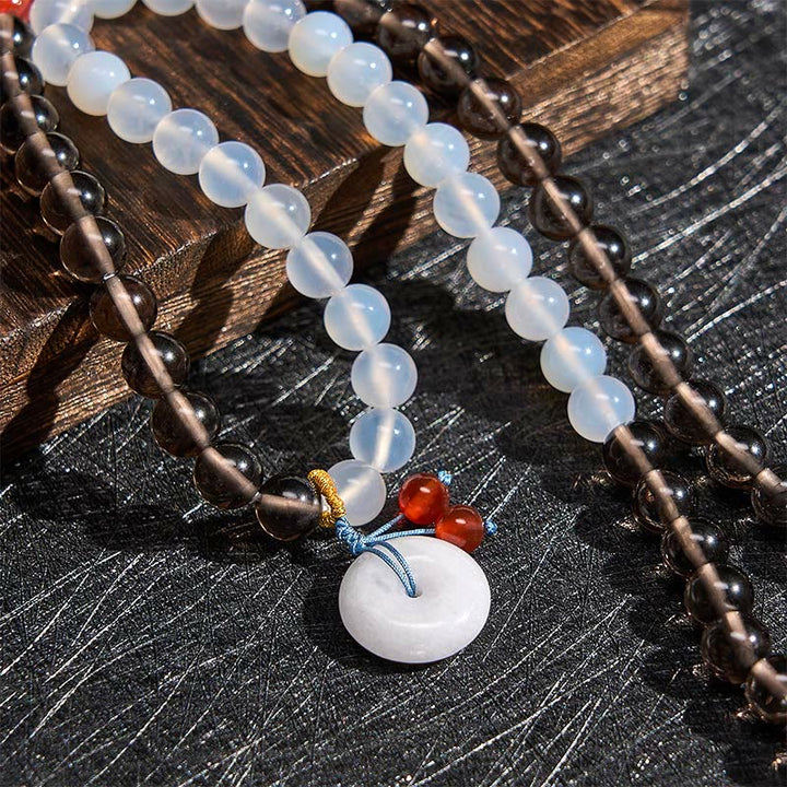 Buddha Stones Pulsera multienrollada con hebilla de paz de obsidiana de hielo y calcedonia blanca, modelo Serenity. - image 4