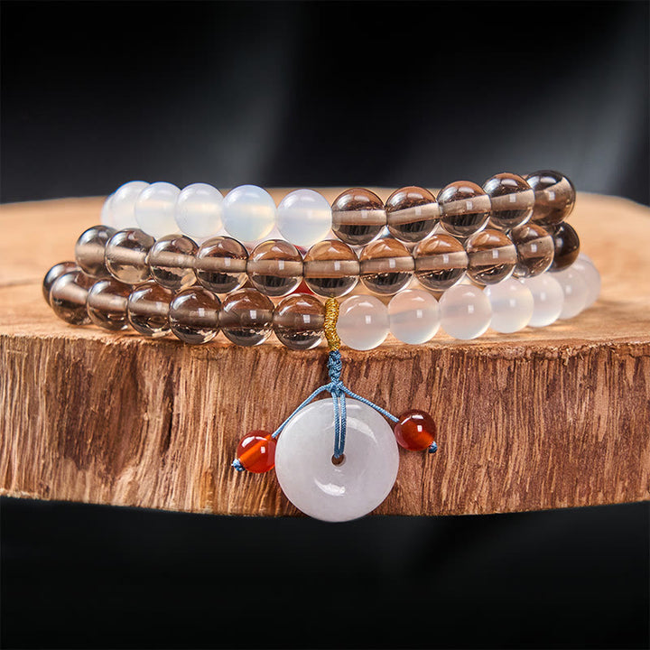 Buddha Stones Pulsera multienrollada con hebilla de paz de obsidiana de hielo y calcedonia blanca, modelo Serenity. - Obsidiana de hielo (Limpieza ♥ Positiva) - 8 mm - image 0