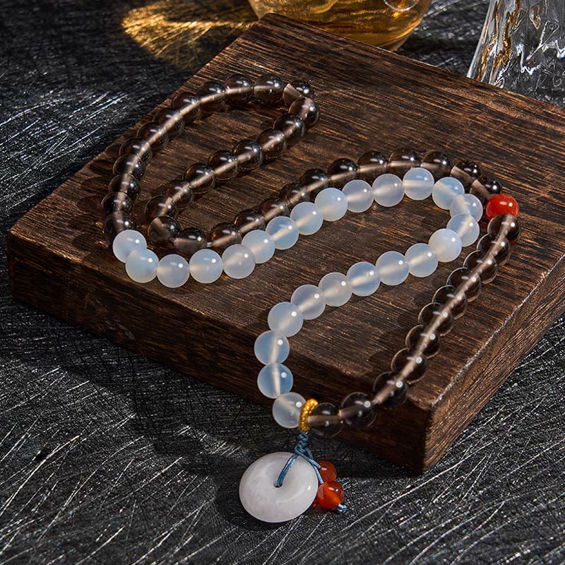 Buddha Stones Pulsera multienrollada con hebilla de paz de obsidiana de hielo y calcedonia blanca, modelo Serenity. - image 3