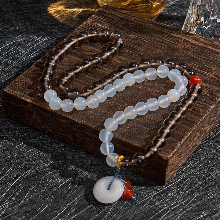 Buddha Stones Pulsera multienrollada con hebilla de paz de obsidiana de hielo y calcedonia blanca, modelo Serenity. - image 3