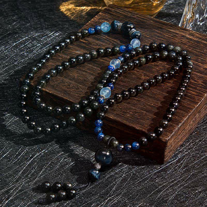 Mala de 108 cuentas con borla redonda de obsidiana negra y Buddha Stones, hecha a mano para protección. - image 1