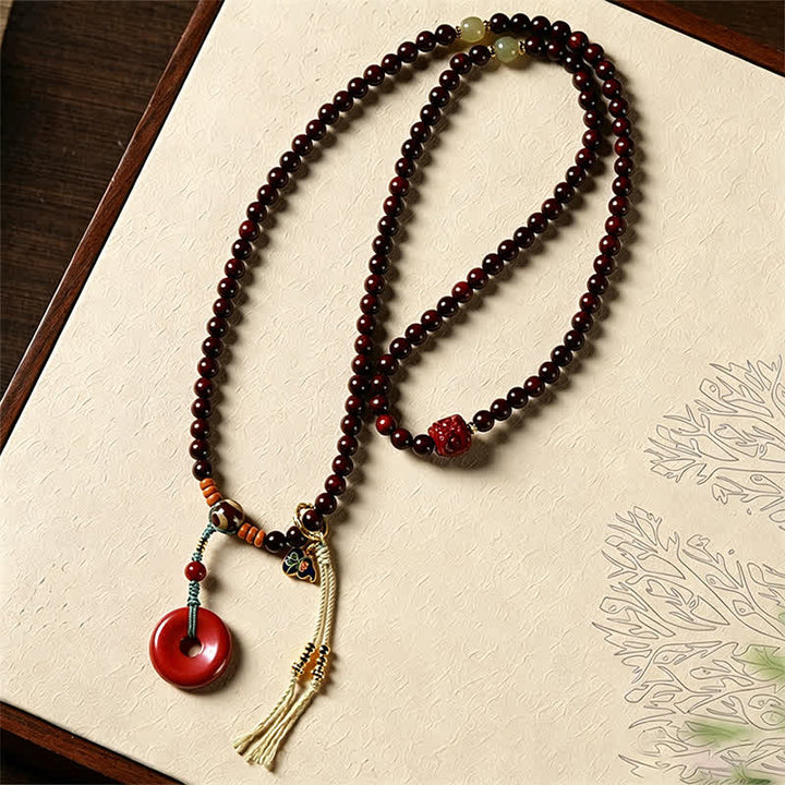 Buddha Stones Mala de protección con hebilla de paz de sándalo rojo, tejido a mano, 108 cuentas. - image 3