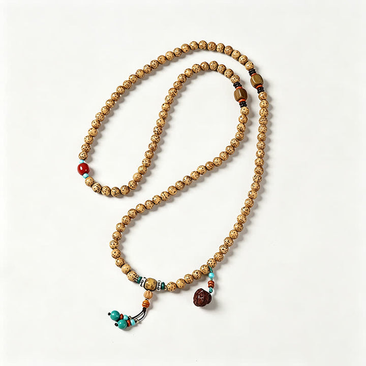 Buddha Stones Mala redonda de 108 cuentas con diseño de estrella, luna, semilla de Bodhi y vaina de loto, elaborada a mano. - image 3