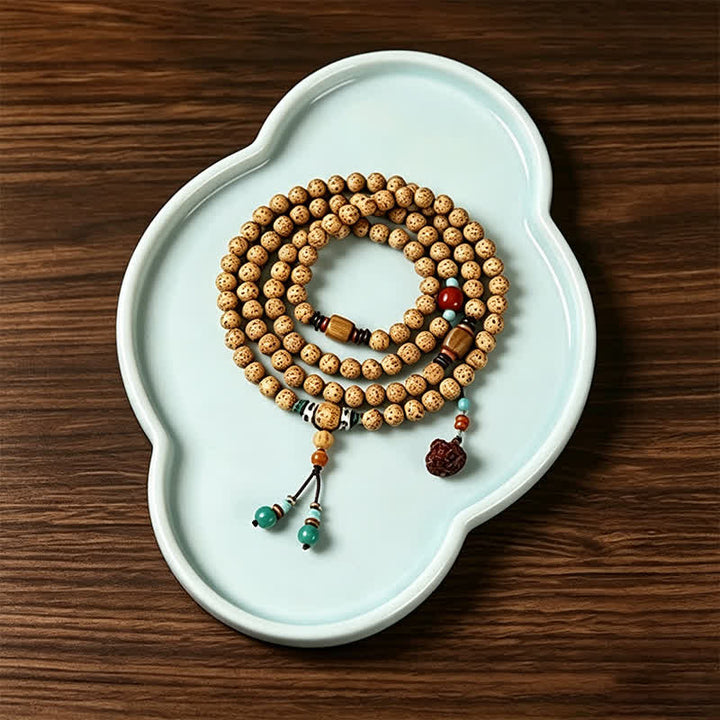 Buddha Stones Mala redonda de 108 cuentas con diseño de estrella, luna, semilla de Bodhi y vaina de loto, elaborada a mano. - image 1