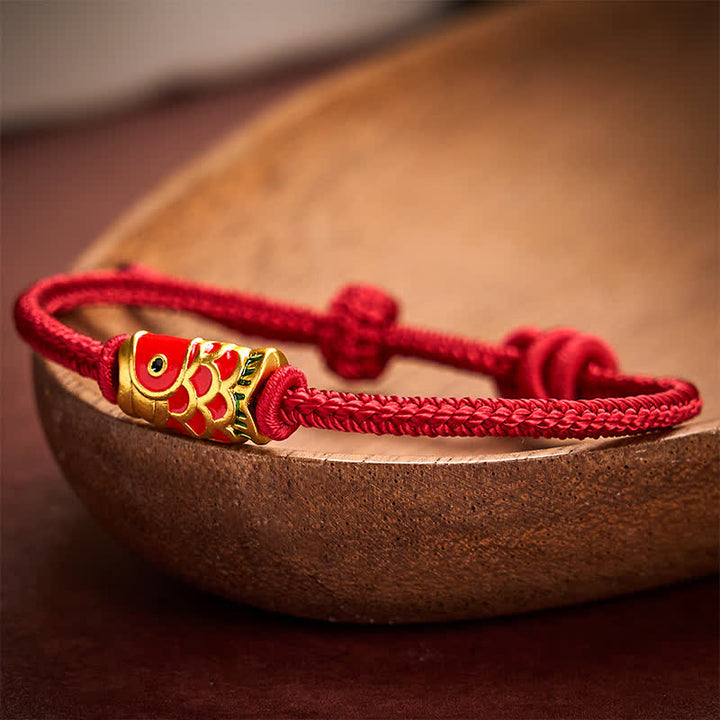 Buddha Stones Pulsera de cordón trenzado ajustable con diseño de pez koi, tejida a mano en rojo. - image 1