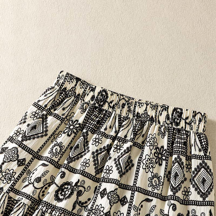 Buddha Stones Falda de mujer de estilo bohemio casual de verano en negro y beige con estampado geométrico floral. - image 3