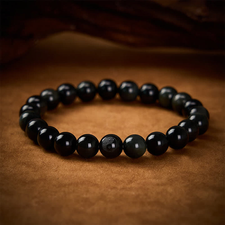 Buddha Stones Pulsera de cuentas redondas de equilibrio Yin Yang de obsidiana arcoíris - Obsidiana arcoíris (cambios de color con la luz) - 8 mm - image 0