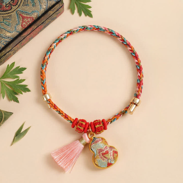 Buddha Stones Pulsera de protección con dije de candado chino, bolsa de dinero de manzana de cinco colores tejida a mano - Calabaza (mismo tono de color, el patrón varía) - image 33
