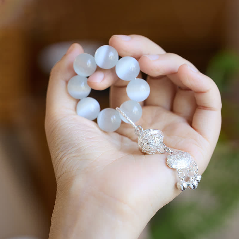 Buddha Stones Adornos de cuentas táctiles para meditación Ruyi con forma de campana de ojo de gato blanco - image 2
