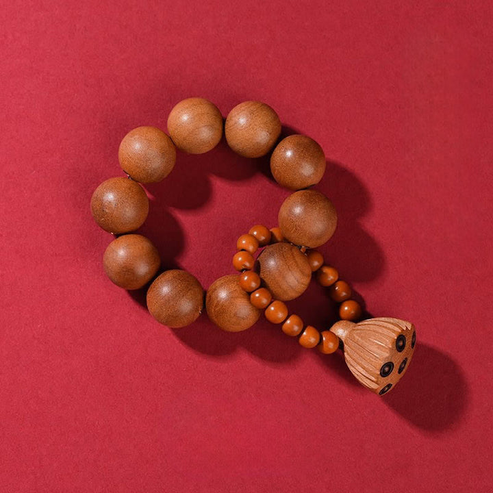 Buddha Stones Decoraciones de cuentas de meditación táctiles pulidas a mano con forma de vaina de loto y madera de durazno. - Madera de durazno (Protección ♥ Purificación) - image 1