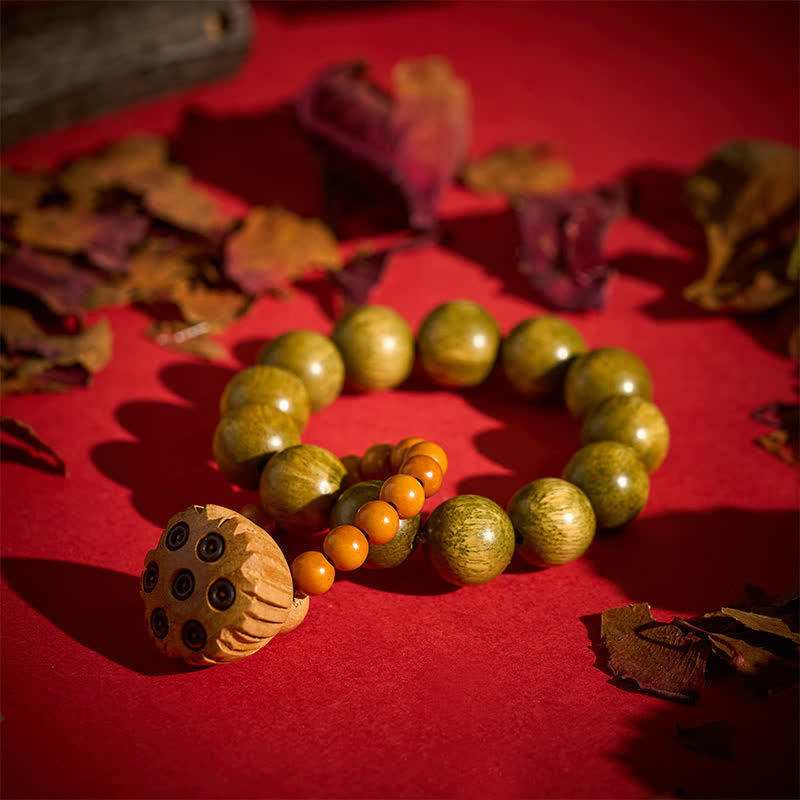 Buddha Stones Decoraciones de cuentas de meditación táctiles pulidas a mano con forma de cápsula de loto de sándalo verde para la sanación. - image 3