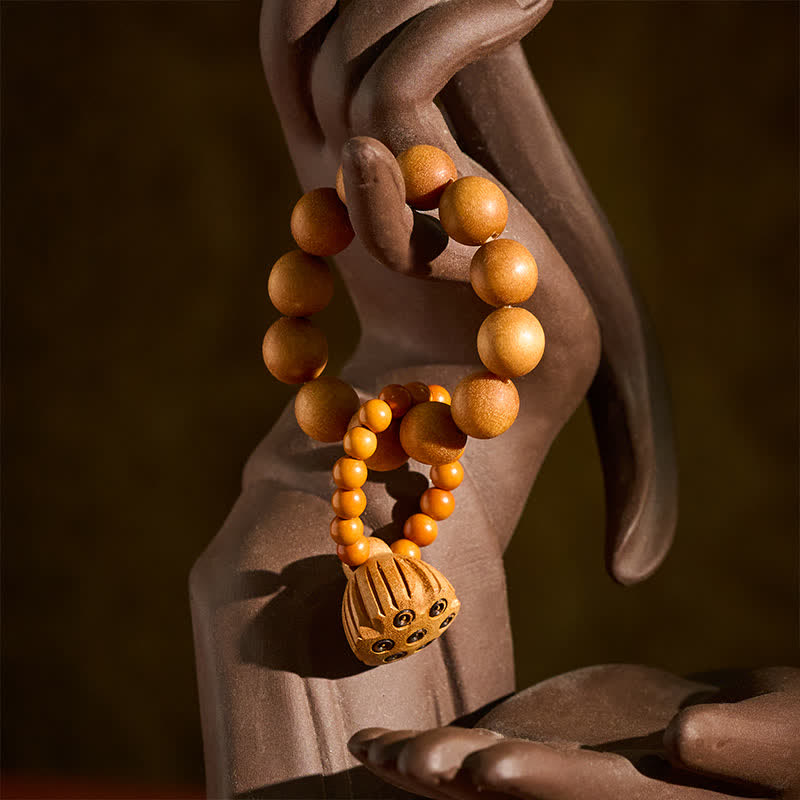 Buddha Stones Decoraciones de cuentas de meditación táctiles pulidas a mano con forma de cápsula de loto de sándalo verde para la sanación. - image 9