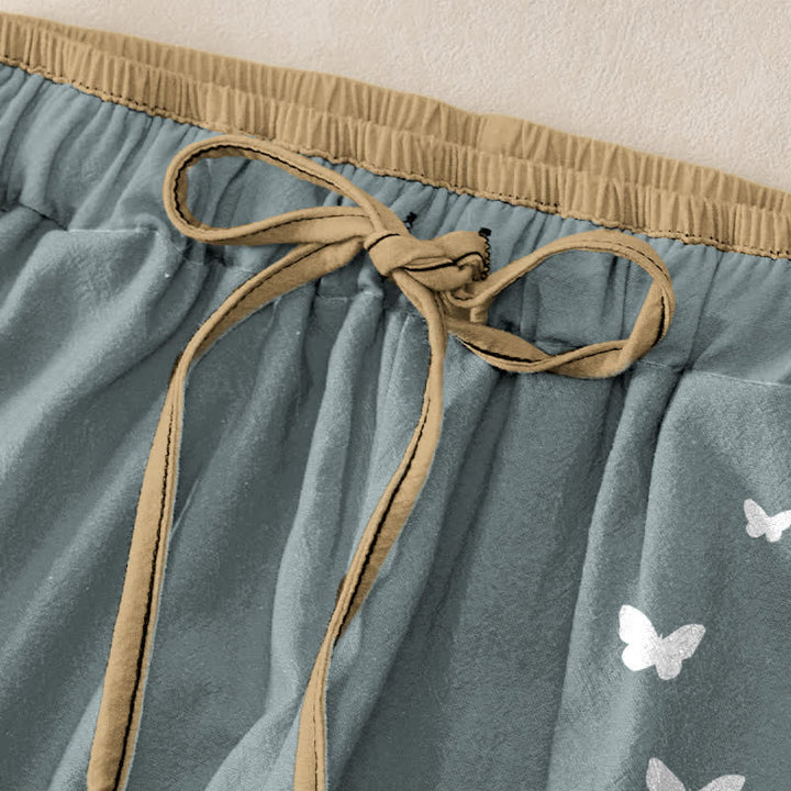 Buddha Stones Pantalones de mujer de algodón puro con estampado de mariposas blancas, cintura elástica y bolsillos. - image 1