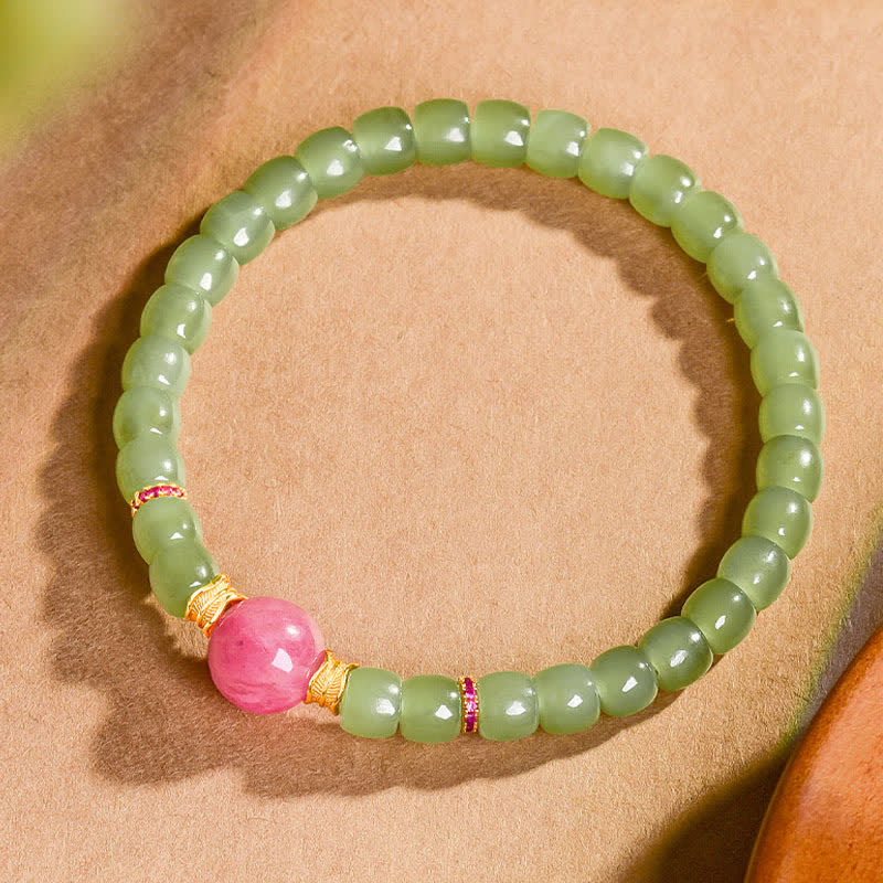 Buddha Stones Pulsera de rodonita con cuentas redondas de jade para la suerte - image 1