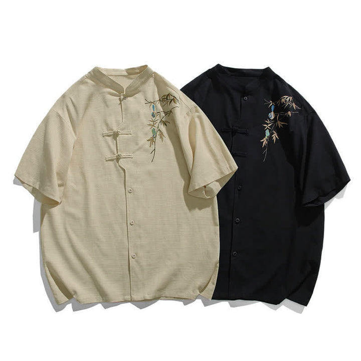 Buddha Stones Camisas de manga corta para hombre estilo Tang de verano con cuello mandarín, botones de rana y bordado de hojas. - image 15