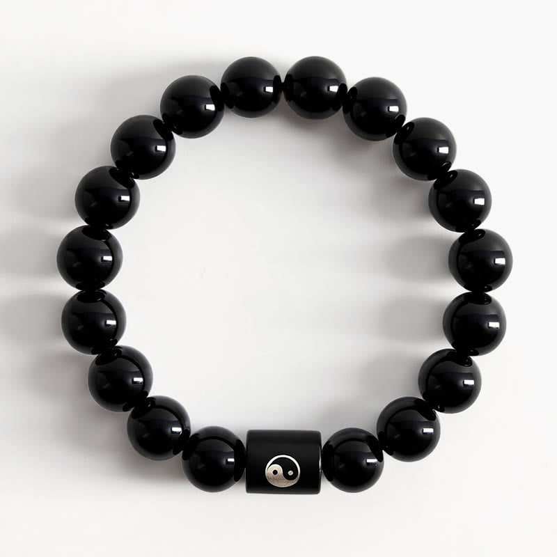 Buddha Stones Pulsera de cuentas cilíndricas con incrustaciones de madera de ébano y símbolo de equilibrio Yin Yang. - image 1