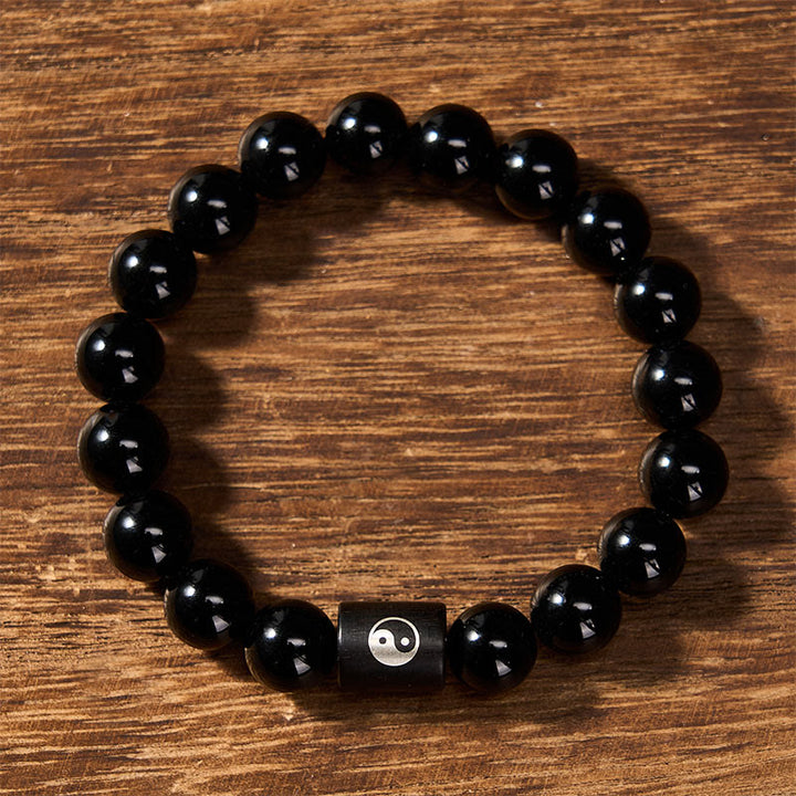 Buddha Stones Pulsera de cuentas cilíndricas con incrustaciones de madera de ébano y símbolo de equilibrio Yin Yang. - image 2
