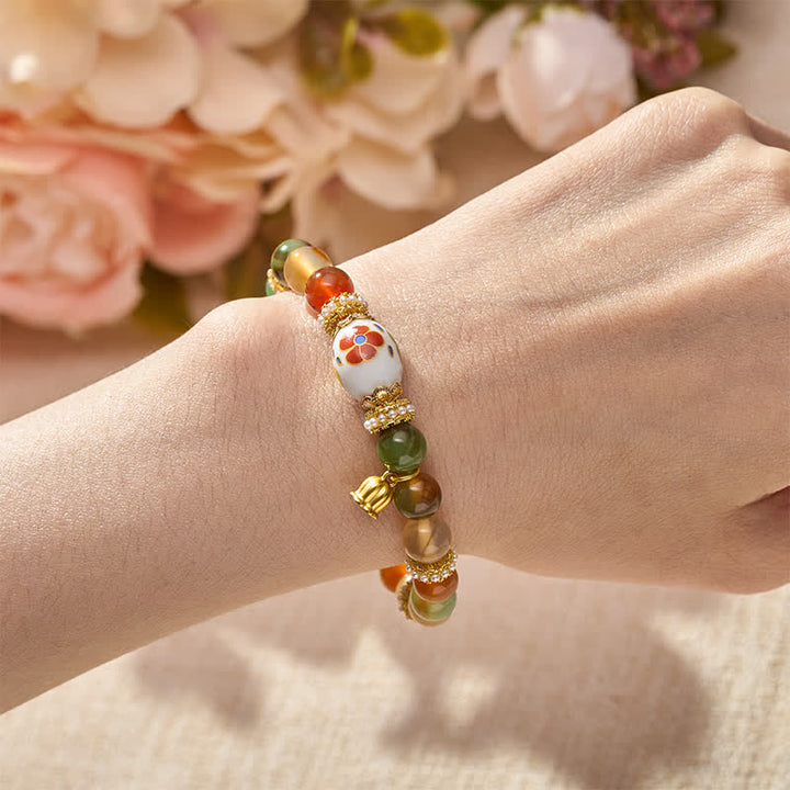 Buddha Stones Colgante de loto con cuentas cilíndricas de cerámica y ágata pavo real natural, pulsera de cuentas redondas que transmiten confianza. - image 4