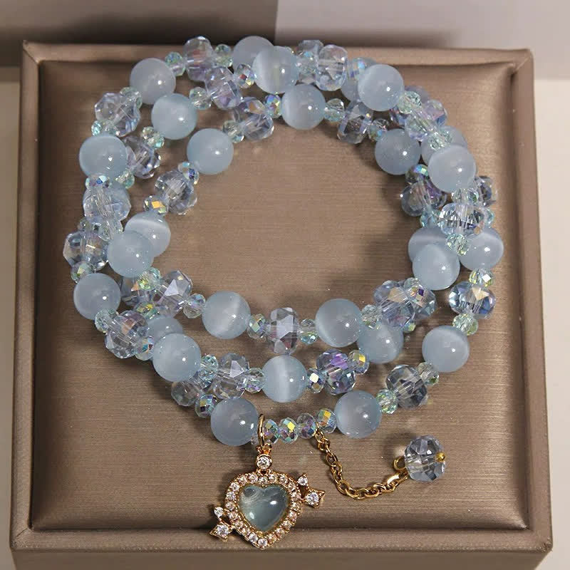 Buddha Stones Pulsera de confianza de triple vuelta con corazón de ojo de gato azul - image 3