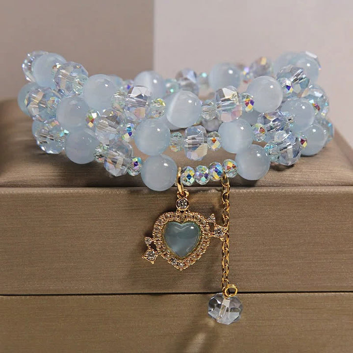 Buddha Stones Pulsera de confianza de triple vuelta con corazón de ojo de gato azul - image 2