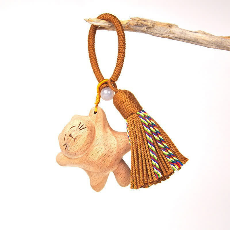 Buddha Stones Llaveros con borla de gato de la suerte, tallados a mano en madera clara. - Gato marrón reclinado - image 24