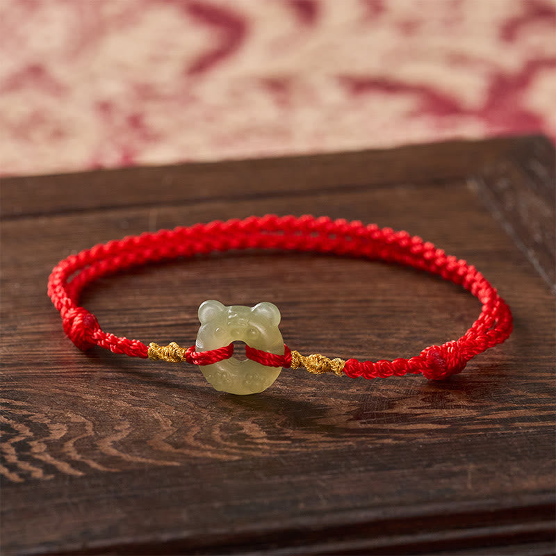 Buddha Stones Pulsera de la prosperidad con hebilla de la paz y cabeza de tigre de jade y cordón rojo - Jade natural (el color puede variar) - image 0