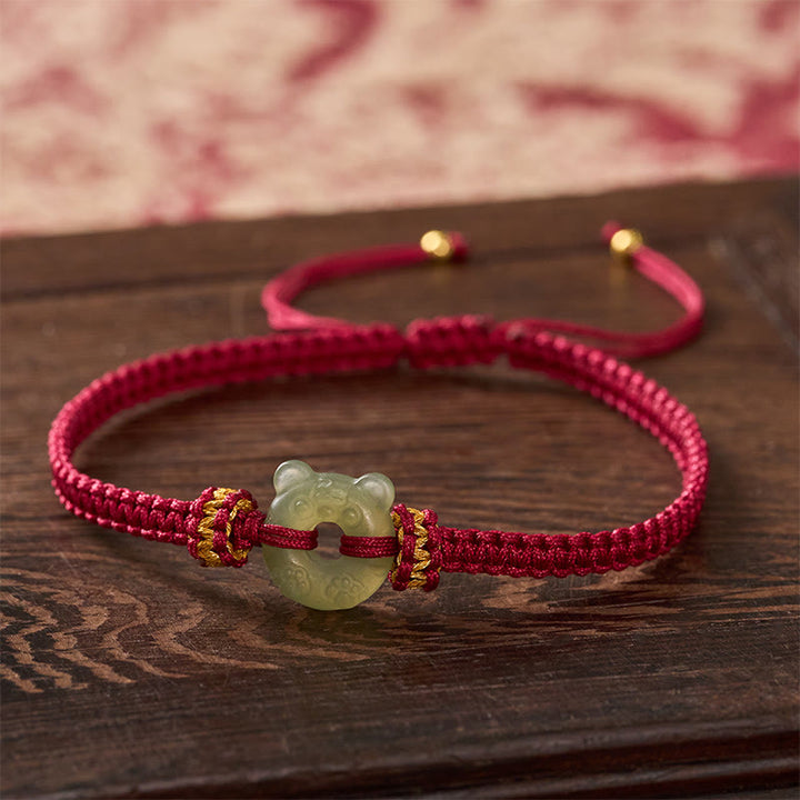 Buddha Stones Pulsera trenzada de hilo rojo con hebilla de paz y diseño de cabeza de tigre de jade - Jade natural (el color puede variar) - 16-18 cm - image 0