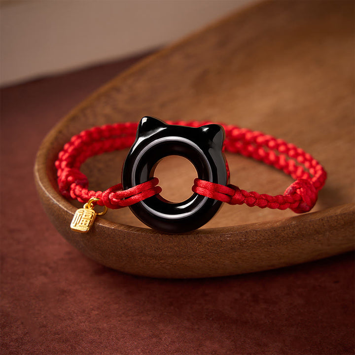 Buddha Stones Pulsera trenzada de protección con hebilla de paz y diseño de gato de obsidiana negra, personaje Fu, con cordón rojo. - image 2