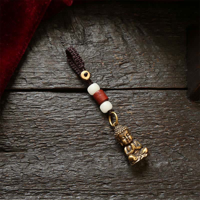 Buddha Stones Llaveros de latón con forma de Buda, cinco monedas de emperador y cordón trenzado, símbolo de la compasión. - Cordón de cuentas blancas - image 1