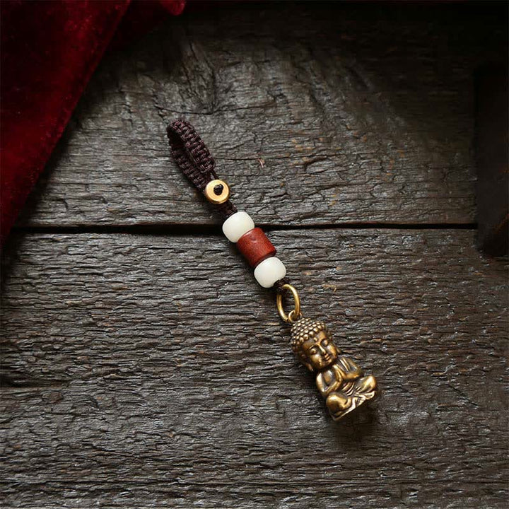 Buddha Stones Llaveros de latón con forma de Buda, cinco monedas de emperador y cordón trenzado, símbolo de la compasión. - Cordón de cuentas blancas - image 1