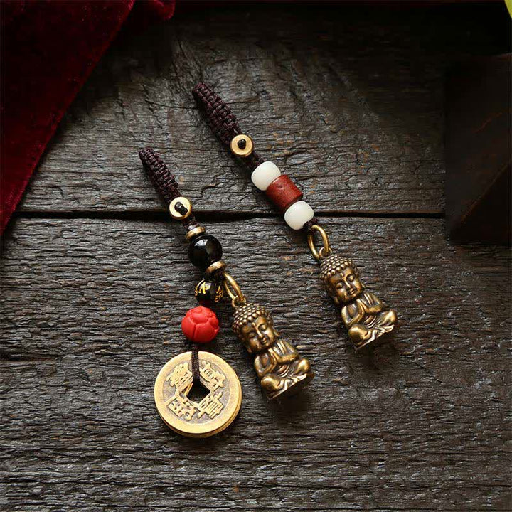 Buddha Stones Llaveros de latón con forma de Buda, cinco monedas de emperador y cordón trenzado, símbolo de la compasión. - image 0