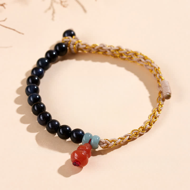 Buddha Stones Pulsera de calabaza tejida a mano con ojo de tigre azul para fortalecer el cuerpo - image 1