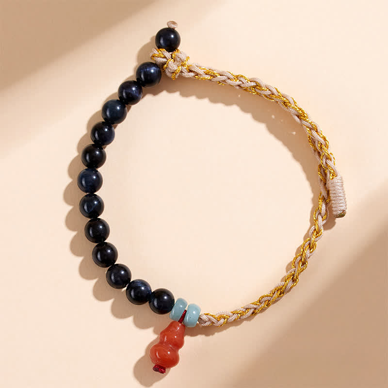 Buddha Stones Pulsera de calabaza tejida a mano con ojo de tigre azul para fortalecer el cuerpo - Ojo de Tigre (Protección ♥ Equilibrio) - image 0