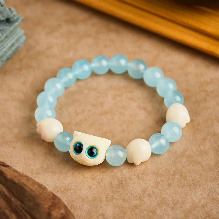 Buddha Stones Pulsera de cuentas de pureza de gato tallada a mano en calcedonia azul - image 1