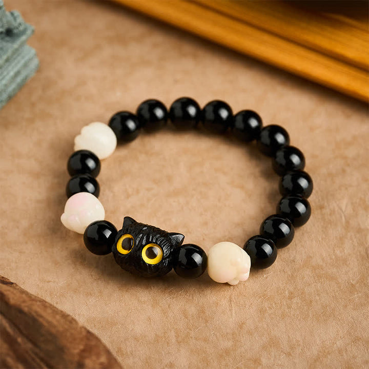 Buddha Stones Pulsera de cuentas de conexión a tierra con cabeza de gato de obsidiana negra tallada a mano y ojos amarillos - Obsidiana negra (Purificación ♥ Fuerza) (Circunferencia de la muñeca: 16–17 cm) - image 0