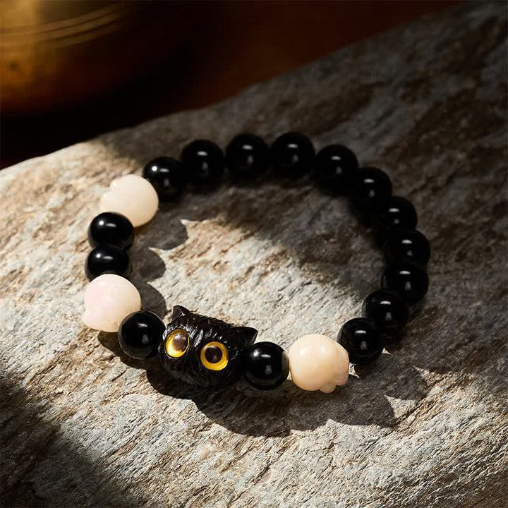 Buddha Stones Pulsera de cuentas de conexión a tierra con cabeza de gato de obsidiana negra tallada a mano y ojos amarillos - image 2
