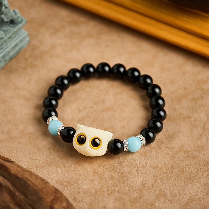 Buddha Stones Pulsera de cuentas con relieve de gato de ojos grandes tallada a mano en obsidiana negra - image 20