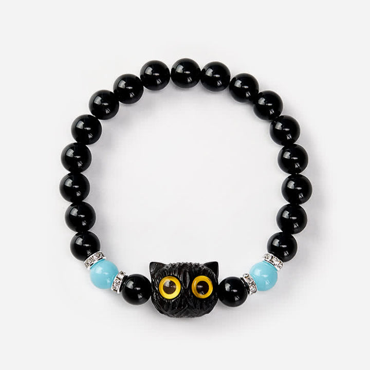 Buddha Stones Pulsera de cuentas con relieve de gato de ojos grandes tallada a mano en obsidiana negra - image 13