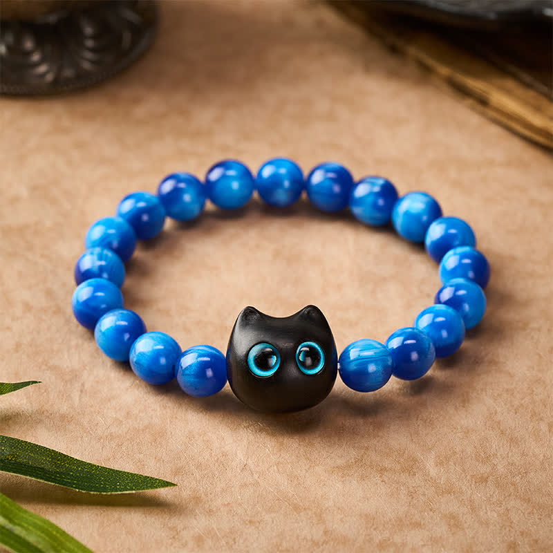 Buddha Stones Pulsera de equilibrio con forma de gato, cuentas de resina azul y madera de ébano. - image 10
