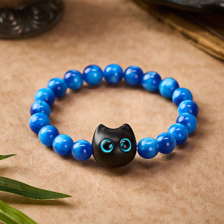 Buddha Stones Pulsera de equilibrio con forma de gato, cuentas de resina azul y madera de ébano. - image 10